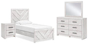 Ashley Furniture Cayboni bedroom set with a bed, dresser, and nightstands in a modern, stylish bedroom arrangement.