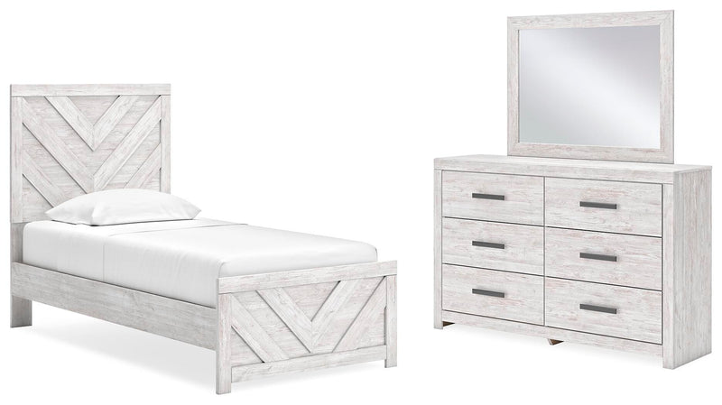 Ashley Furniture Cayboni bedroom set with modern bed frame, nightstands, and dresser in a stylish bedroom scene.
