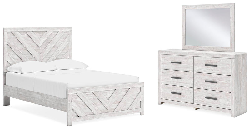 Ashley Furniture Cayboni bedroom set with a modern bed frame, matching nightstands, and coordinating bedroom furniture in warm wood finish.