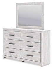Ashley Furniture Cayboni dresser with matching mirror, featuring a modern design and wood finish, shown from an angled side view.