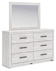 Ashley Furniture Cayboni dresser and mirror set with a sleek wooden finish and modern design, shown from an angled side view.