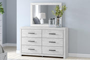 Ashley Furniture Cayboni dresser and mirror set, featuring a modern wooden dresser with a matching sleek mirror.