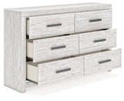 Ashley Furniture Cayboni dresser with open drawers showing spacious storage and a modern wood finish.