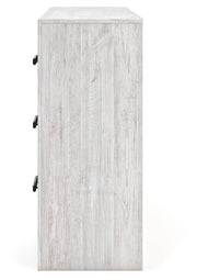 Ashley Furniture Cayboni Dresser with sleek wood finish and multiple drawers, shown in a modern bedroom setting.