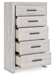 Ashley Furniture Cayboni chest of drawers with open top drawer, showcasing modern wooden design and ample storage space.