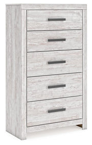 Ashley Furniture Cayboni chest of drawers, angled view showing wood finish and multiple storage drawers.