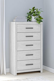 Ashley Furniture Cayboni chest of drawers, wooden storage chest with multiple drawers and modern design, shown in a light finish.