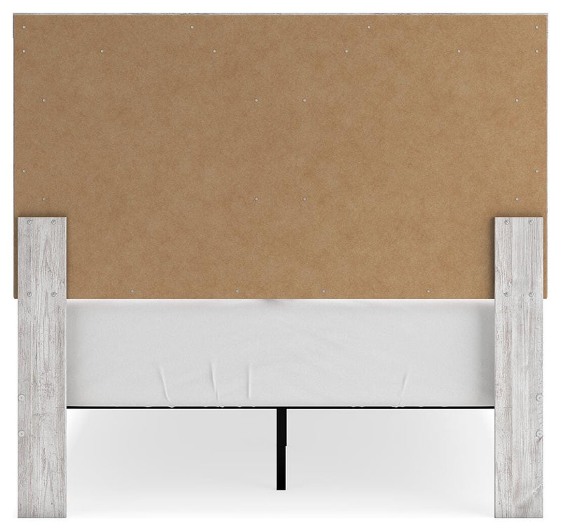 Ashley Furniture Cayboni bedroom set includes a bed, nightstands, and dresser in a modern bedroom design.