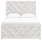 Ashley Furniture Cayboni bedroom set with a headboard, dresser, and matching nightstands arranged in a modern bedroom scene.