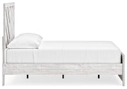Ashley Furniture Cayboni bedroom set with a modern bed frame, matching nightstands, and dresser in a stylish bedroom scene.