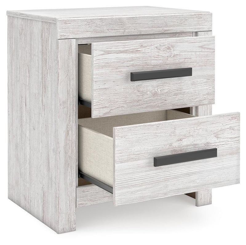 Ashley Furniture Cayboni bedroom set with bed, nightstands, and dresser in a modern bedroom arrangement.