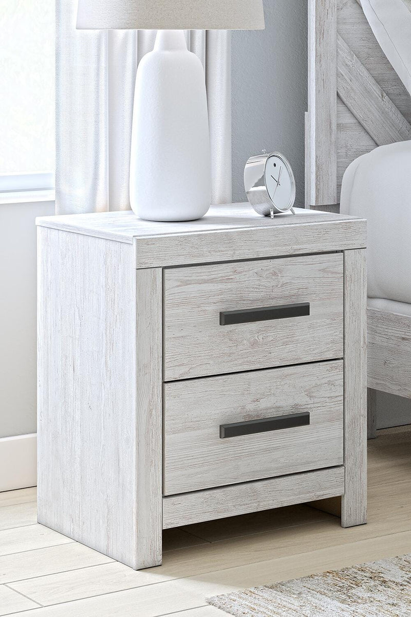 Ashley Furniture Cayboni nightstand with a dark wood finish, featuring a single drawer and open shelf for bedroom storage.