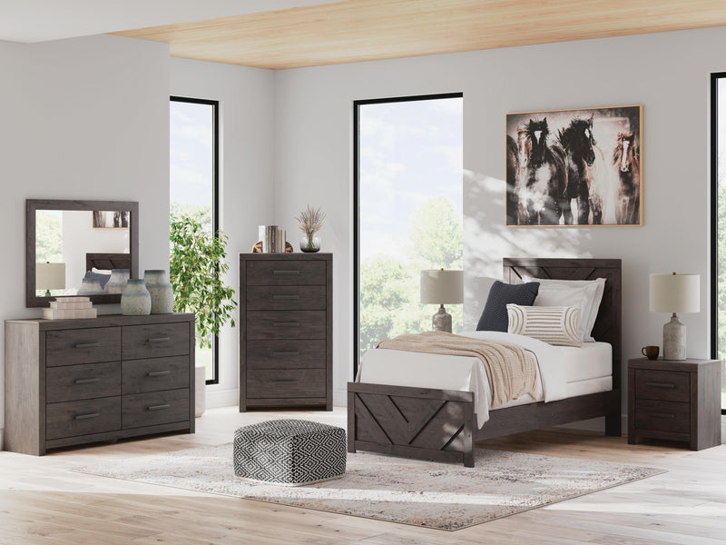 Ashley Furniture Prendonea nightstand with a sleek wood finish and modern design, featuring a single drawer and open shelf.