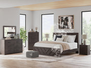 Ashley Furniture Prendonea dresser with multiple drawers, dark wood finish, and classic design for bedroom storage.