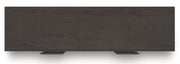 Ashley Furniture Prendonea dresser with sleek top surface and modern design, featuring multiple drawers for ample storage.