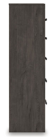 Ashley Furniture Prendonea chest of drawers, wooden bedroom storage unit with multiple drawers and modern design.