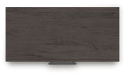 Ashley Furniture Prendonea chest of drawers with a sleek wood finish and modern design, featuring multiple spacious drawers.