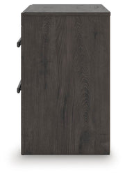 Ashley Furniture Prendonea nightstand with a sleek wood finish and modern design, featuring a drawer and open shelf for storage.
