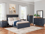 Ashley Furniture Landocken bedroom set with a modern bed frame, matching nightstands, and a stylish dresser in a cozy bedroom scene.