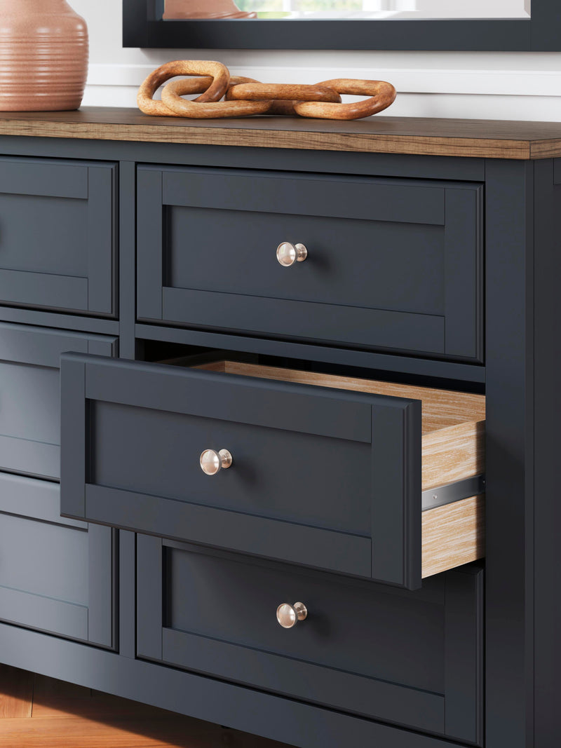 Ashley Furniture Landocken Bedroom Set with bed frame, nightstands, and dresser in a stylish bedroom package.
