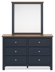 Ashley Furniture Landocken bedroom set with headboard, dresser, and nightstands in a modern bedroom layout.