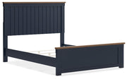 Ashley Furniture Landocken bedroom set with a bed, nightstands, and dresser shown from an angled view in a modern bedroom.