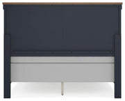 Ashley Furniture Landocken bedroom set with a bed, nightstands, and dresser in a modern bedroom scene.