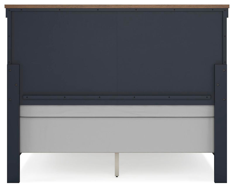 Ashley Furniture Landocken bedroom set with a bed, nightstands, and dresser in a modern bedroom scene.