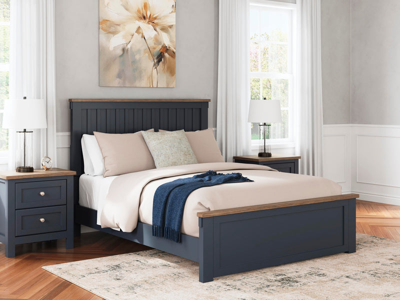 Ashley Furniture Landocken Bedroom Set with a modern bed frame, matching nightstands, and dresser in a contemporary bedroom design.