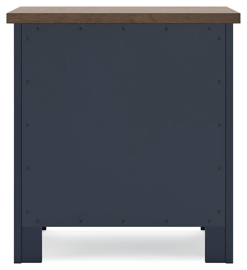 Ashley Furniture Landocken bedroom set with a bed, nightstands, and dresser in a modern bedroom design.