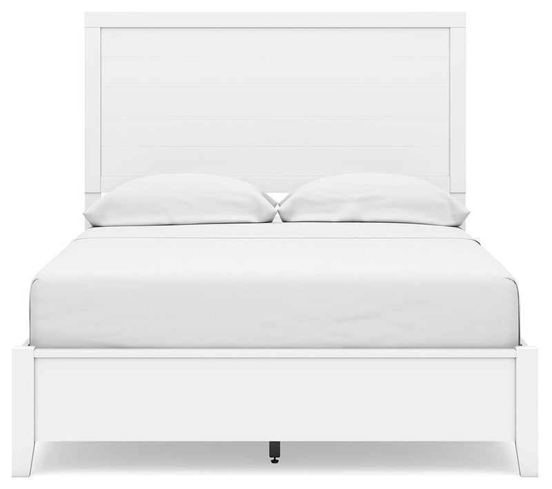 Ashley Furniture Binterglen Bedroom Set with headboard and matching bedroom furniture in a modern bedroom scene