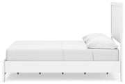Ashley Furniture Binterglen bedroom set with a bed, nightstands, and dresser in a modern bedroom interior.