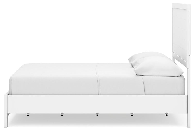 Ashley Furniture Binterglen bedroom set with a bed, nightstands, and dresser in a modern bedroom interior.