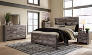 Ashley Furniture Wynnlow bedroom set featuring a bed frame, nightstands, and dresser in a modern, elegant bedroom scene.