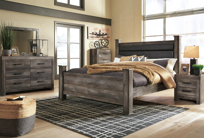 Ashley Furniture Wynnlow bedroom set with a modern bed frame, matching nightstands, and dresser in a stylish bedroom setting.