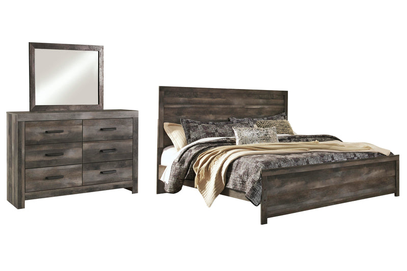 Ashley Furniture Wynnlow bedroom set with a stylish bed, nightstands, and dresser in a modern bedroom design.