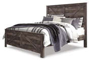 Ashley Furniture Wynnlow bedroom set featuring a bed with a matching dresser and nightstand in a stylish, modern design.