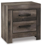 Ashley Furniture Wynnlow bedroom set featuring a bed, nightstands, and dresser with classic wood finish and elegant design.