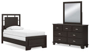Ashley Furniture Covetown bedroom set with a bed, dresser, and nightstands in a modern bedroom scene.