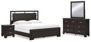 Ashley Furniture Covetown bedroom set with a modern bed frame, nightstands, and matching dresser in a stylish bedroom scene.