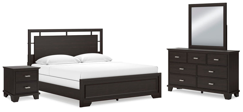 Ashley Furniture Covetown Bedroom Set with bed, dresser, and nightstands arranged in a stylish bedroom scene.
