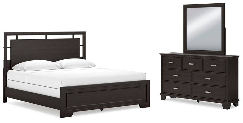 Ashley Furniture Covetown bedroom set with a modern bed, matching nightstands, and dresser in a stylish bedroom scene.
