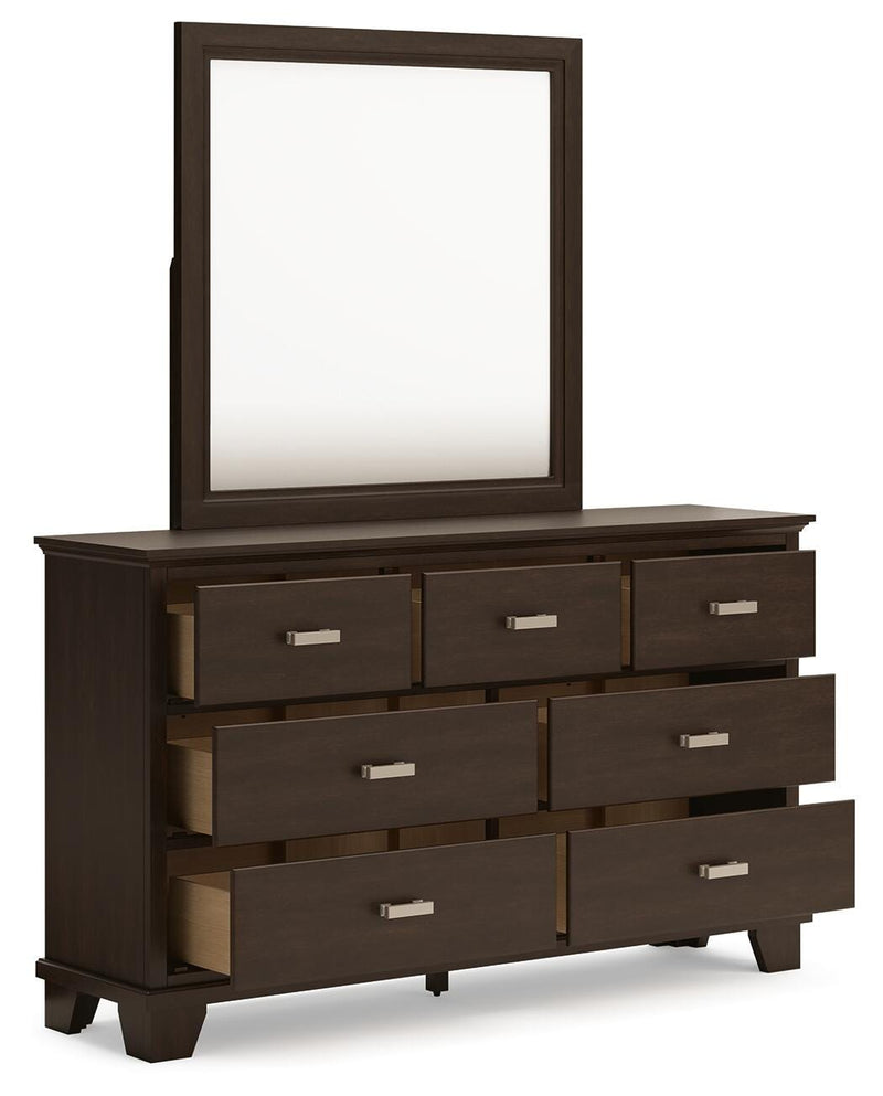 Ashley Furniture Covetown bedroom set including bed frame, nightstands, and dresser, shown from an angled open view.