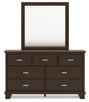 Ashley Furniture Covetown bedroom set with a headboard and matching bedroom furniture, shown from a front view.
