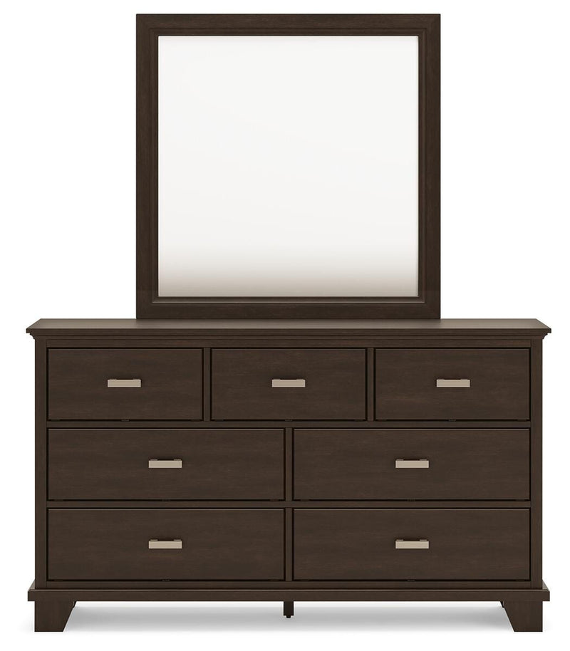 Ashley Furniture Covetown bedroom set with a headboard and matching bedroom furniture, shown from a front view.