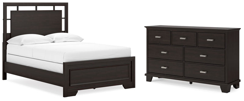 Ashley Furniture Covetown bedroom set including bed frame, nightstands, and dresser in a modern bedroom design.