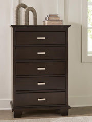 Ashley Furniture Covetown chest of drawers with six spacious wooden drawers in a rustic finish.