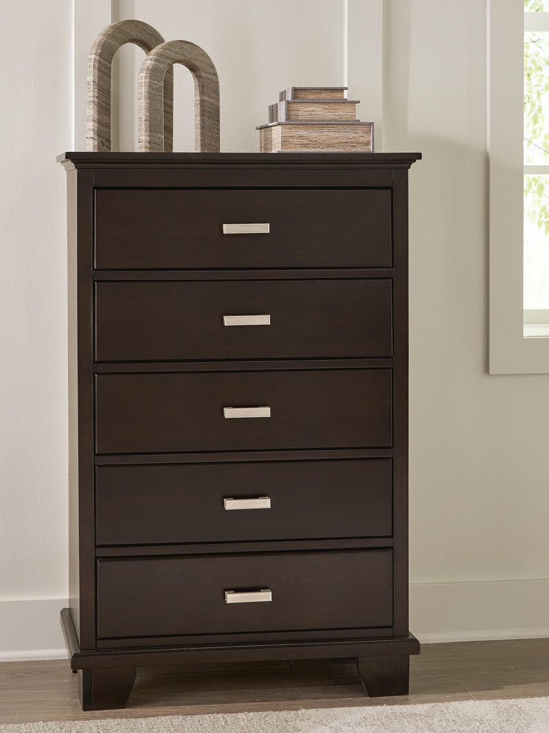 Ashley Furniture Covetown chest of drawers with six spacious wooden drawers in a rustic finish.