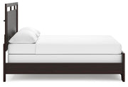 Ashley Furniture Covetown bedroom set featuring a bed, nightstands, and dresser in a stylish bedroom scene.