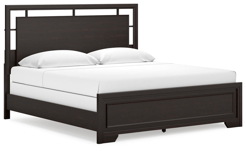 Ashley Furniture Covetown bedroom set with bed, nightstands, and dresser shown from an angled view in a stylish bedroom scene.